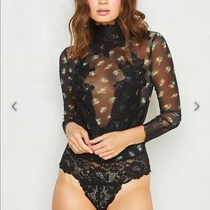 New from HAH “Take a Bow” bodysuit. New with tags Size S